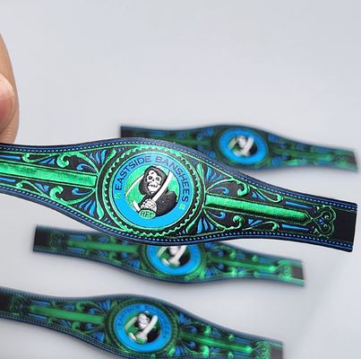 प्रीमियम कस्टम OEM वाटरप्रूफ विनाइल मुद्रित सिगार रिंग स्पॉट यूवी और एम्बोस्ड प्रिंटिंग के साथ उच्च गुणवत्ता वाले व्यक्तिगत ब्रांडिंग वाटरप्रूफ सिगार लेबल स्टिकर