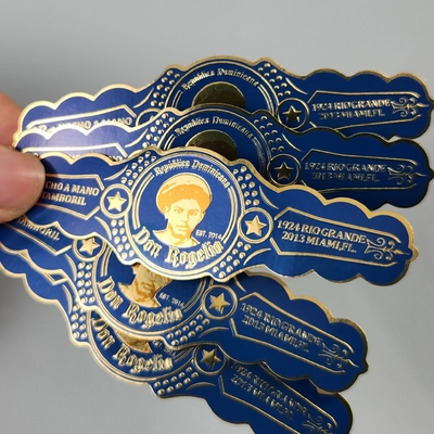 अच्छी कीमत निजी लोगो चिपकने वाला स्टिकर के साथ उच्च गुणवत्ता OEM सिगार लेबल पार्टी और शादी और क्रिसमस के लिए विनाइल मुद्रित सिगार लेबल के साथ यूवी 3 डी एम्बोस्ड प्रिंटिंग गोल्ड फ़ॉइल ऑनलाइन