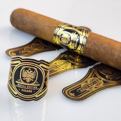 अच्छी कीमत 2025 गर्म बिक्री जलरोधक उच्च गुणवत्ता कस्टम सिगार लेबल निजी लोगो और ब्रांडों के साथ गोल्ड फोइल प्रिंटिंग एम्बोस्ड प्रिंटिंग क्विक स्टिकर ऑनलाइन